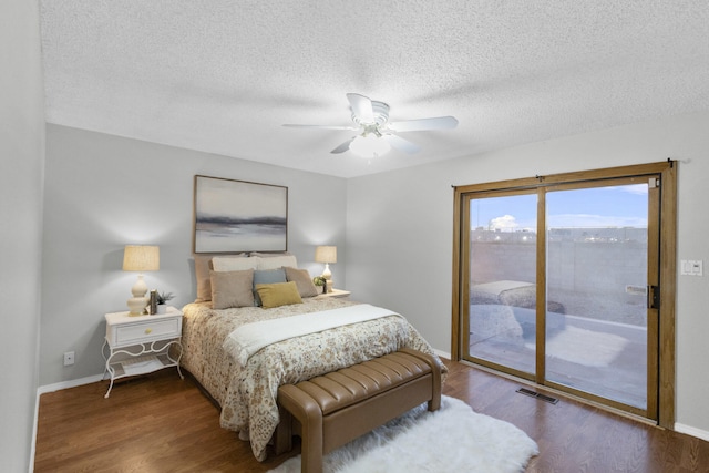 bedroom with hardwood / wood-style floors, ceiling fan, a textured ceiling, and access to outside