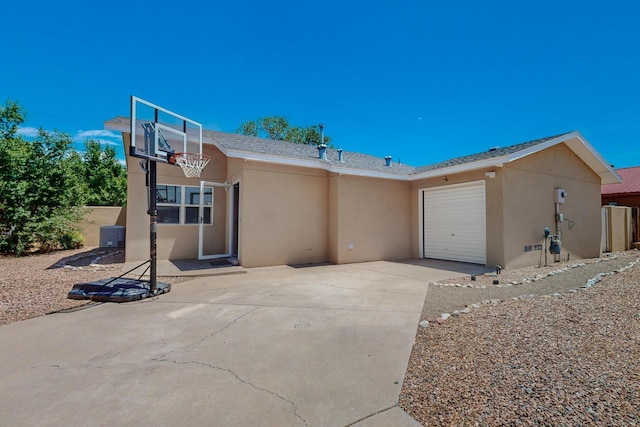 exterior space with a garage