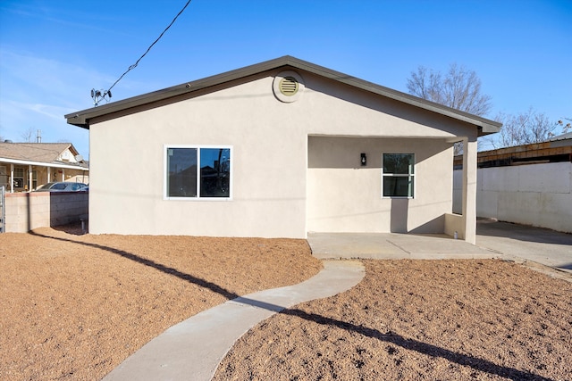 rear view of property with a patio area