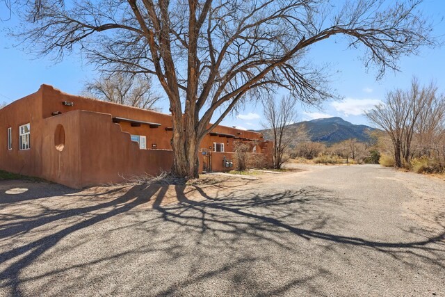 rear view of house with a fire pit