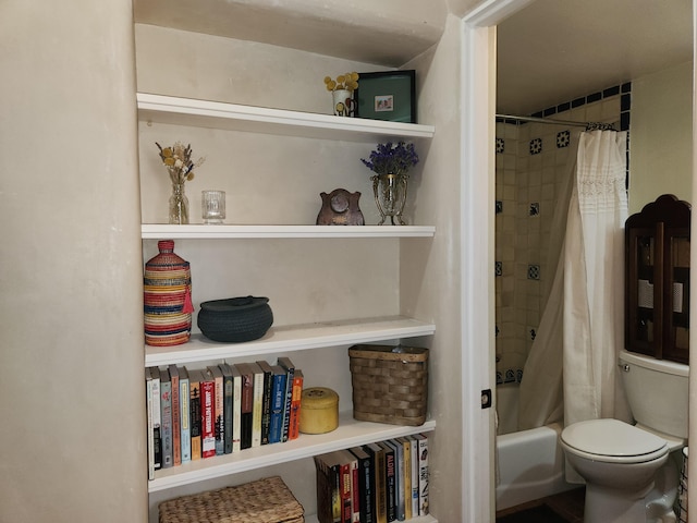 full bathroom with toilet and shower / bathtub combination with curtain