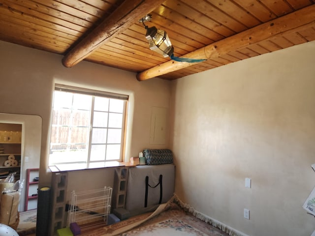 interior space featuring wood ceiling and beamed ceiling