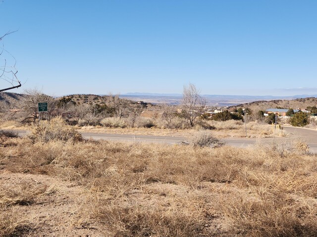 view of mountain feature featuring a rural view