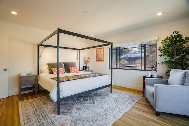 bedroom featuring wood-type flooring