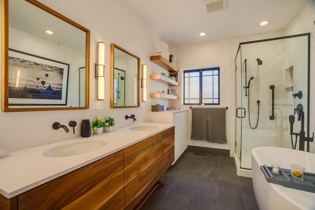 bathroom featuring separate shower and tub, tile patterned floors, and vanity