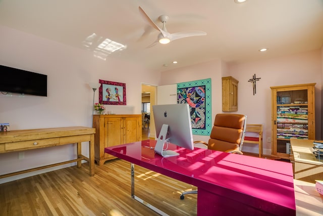 office featuring ceiling fan and hardwood / wood-style flooring