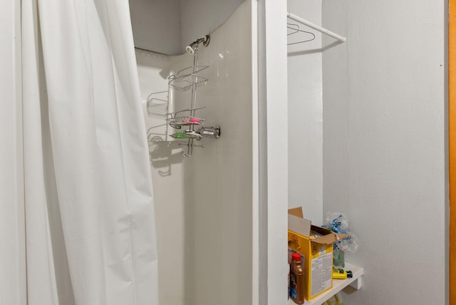 interior space featuring curtained shower