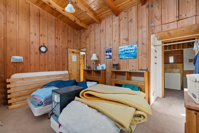 bedroom featuring lofted ceiling with beams, carpet, wooden walls, and wood ceiling