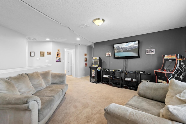 carpeted living room featuring a textured ceiling