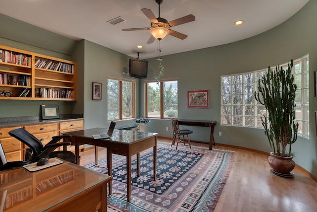 office featuring ceiling fan and wood-type flooring