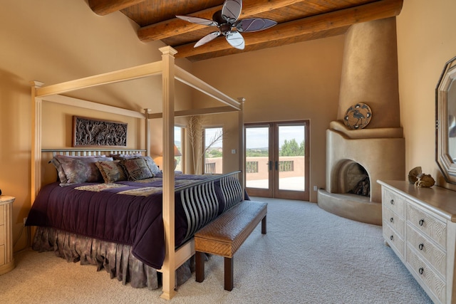 carpeted bedroom featuring beamed ceiling, access to exterior, ceiling fan, and wood ceiling