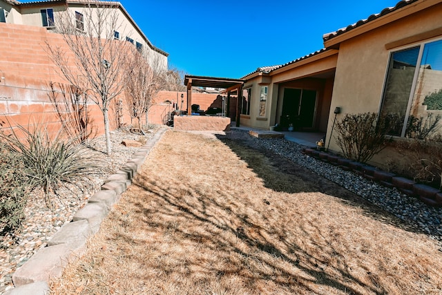 view of yard featuring a fenced backyard and a patio