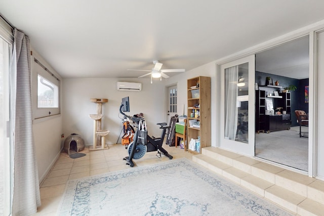 workout room featuring ceiling fan, light tile patterned floors, french doors, and a wall unit AC