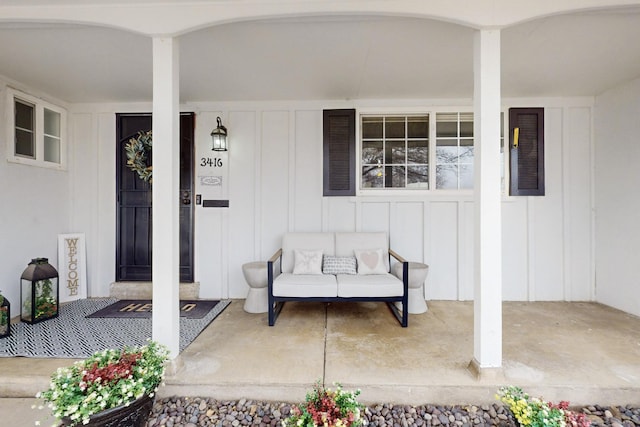 property entrance with covered porch