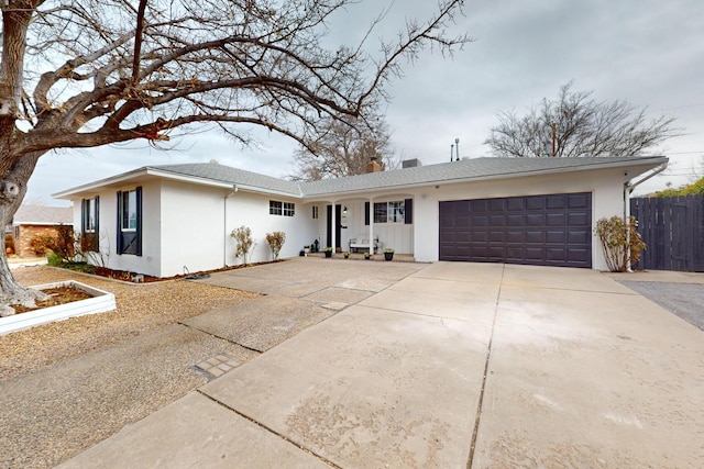 ranch-style house featuring a garage