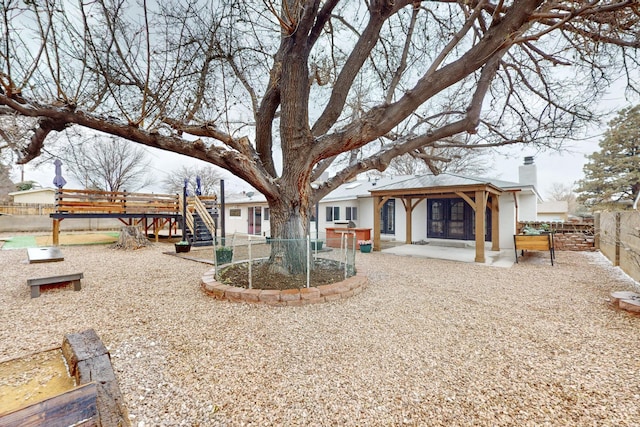 back of property featuring a patio