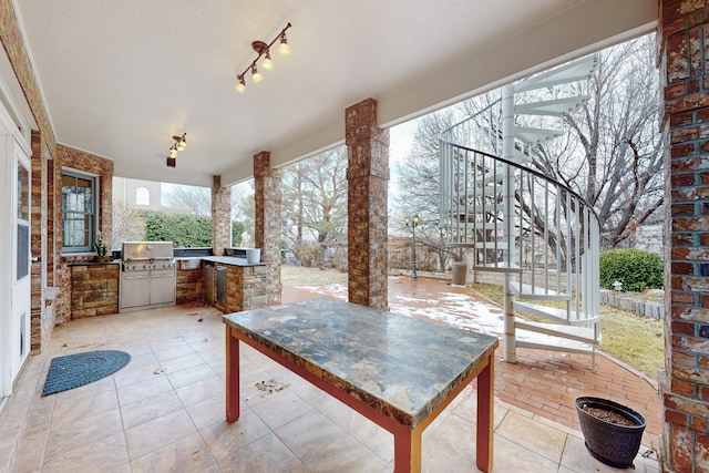 view of patio featuring a grill and exterior kitchen