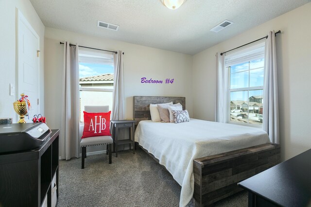 bedroom with a textured ceiling