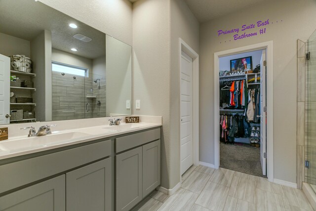 bathroom with vanity and walk in shower