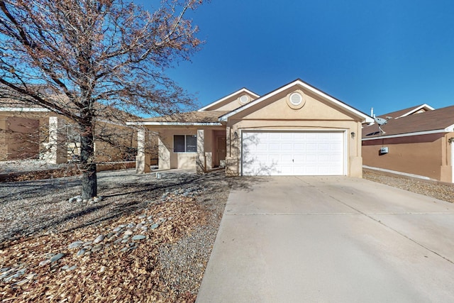 ranch-style home featuring a garage