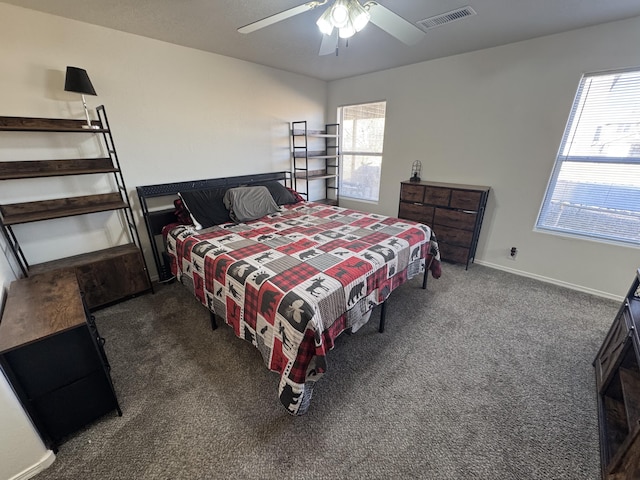 carpeted bedroom featuring ceiling fan