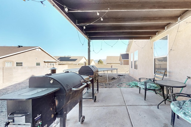 view of patio featuring a grill