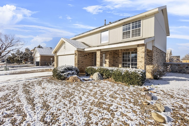 front facade with a garage