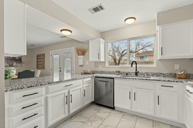 kitchen featuring sink, white cabinetry, dishwasher, kitchen peninsula, and light stone countertops