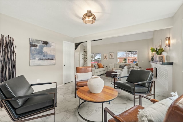 living room featuring a fireplace