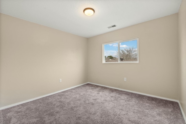 unfurnished room with carpet