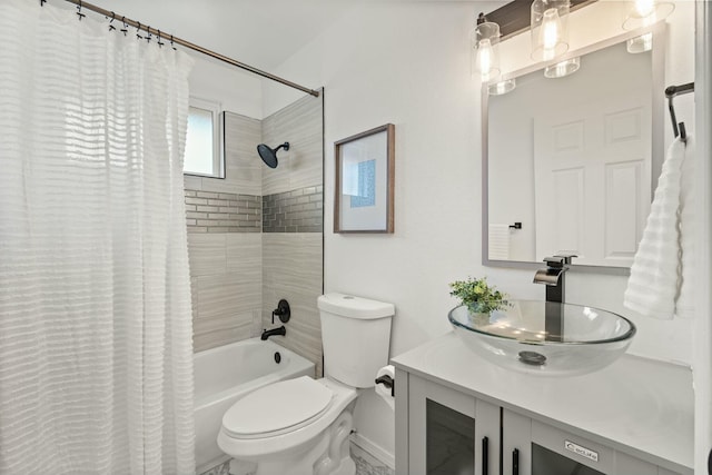 full bathroom featuring toilet, vanity, and shower / bath combo