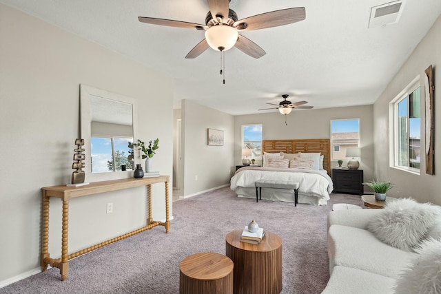 carpeted bedroom with ceiling fan