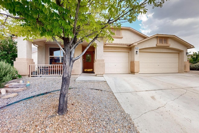 view of front of home with a garage and a porch