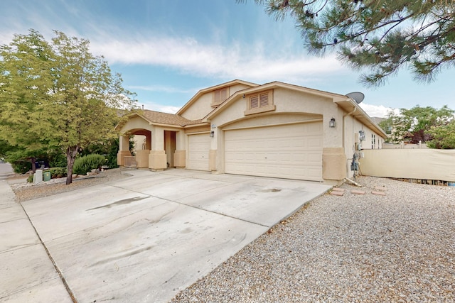 view of front of property featuring a garage