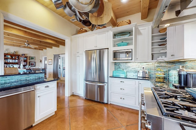 kitchen with tasteful backsplash, wood ceiling, white cabinets, appliances with stainless steel finishes, and beamed ceiling