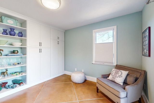 living area with light tile patterned flooring