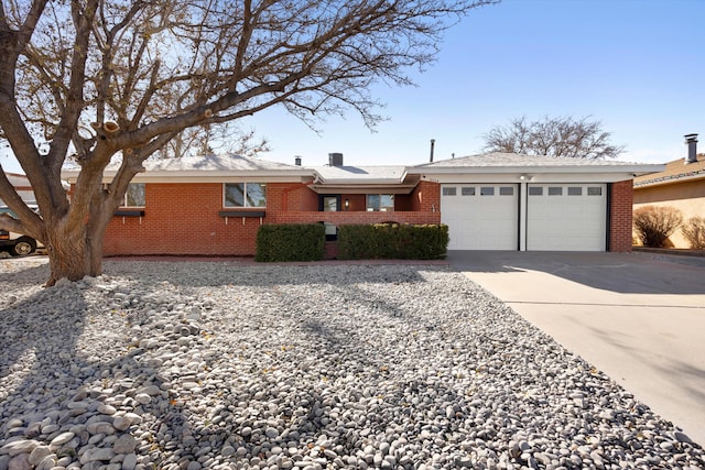 ranch-style home with a garage