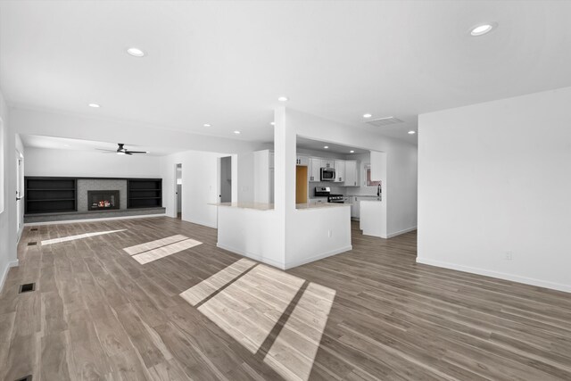 unfurnished room with dark wood-type flooring