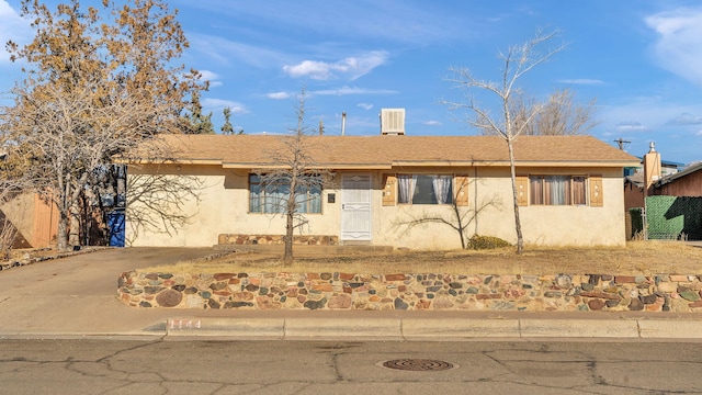 single story home with stucco siding