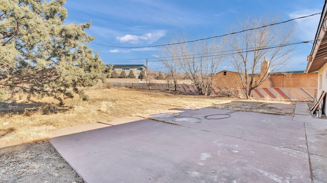 view of yard with a patio area and fence