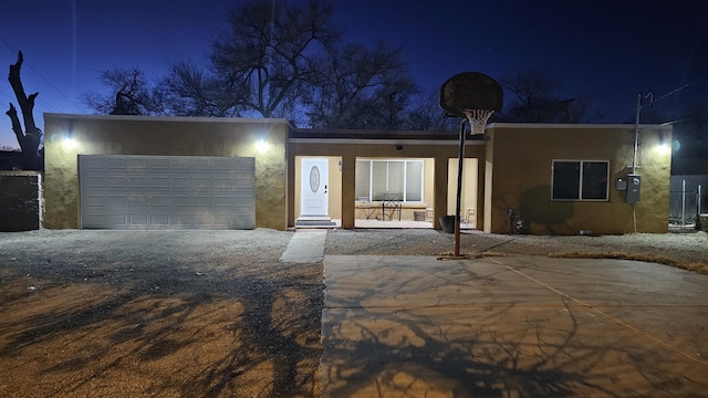 view of front of home with a garage