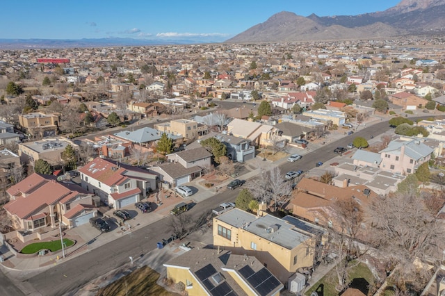 birds eye view of property featuring a mountain view