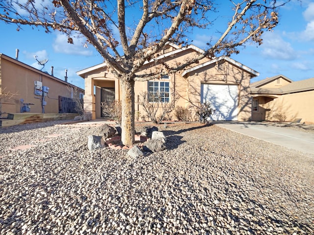 ranch-style house featuring a garage