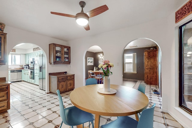 dining space featuring ceiling fan