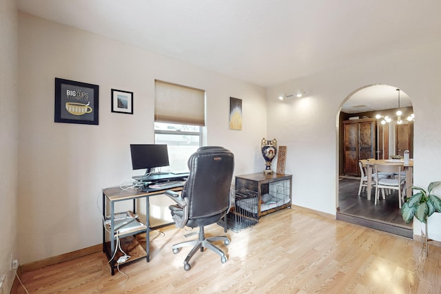 office with light hardwood / wood-style flooring