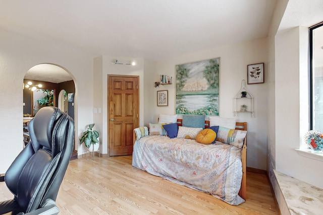 bedroom with light wood-type flooring