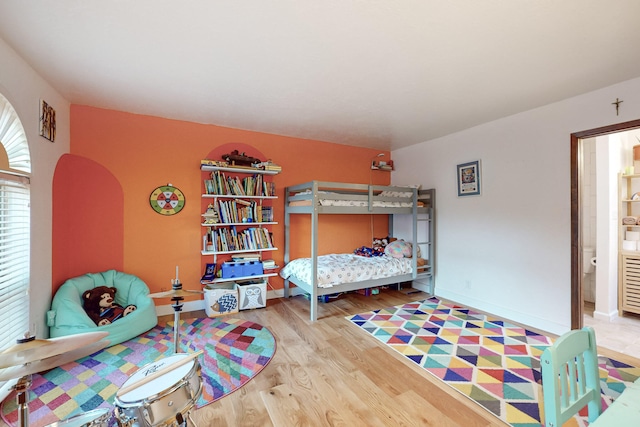 bedroom featuring hardwood / wood-style floors