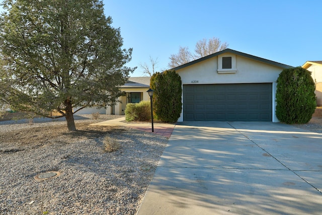 single story home with a garage