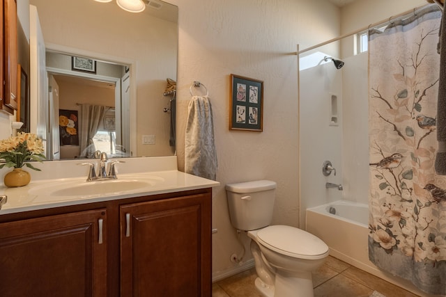 full bathroom featuring toilet, tile patterned flooring, shower / bath combination with curtain, and vanity