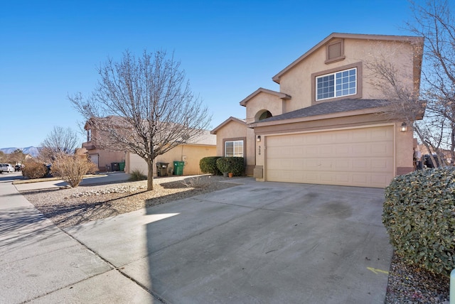 front of property with a garage